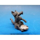 An Austrian cold painted figure of a cat with bowl (height 3cm)