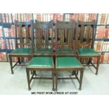 Six oak dining chairs with pieced Art Nouveau decoration and upholstered seats.