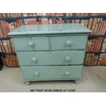 A painted pine chest of drawers (W91 x D45 x H87cm) and a table