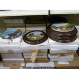 A very large quantity of collectors plates and cups by Spode, Royal Worcester, Doulton etc.