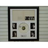 An autographed montage of The Beatles The White Album signed by John Lennon, Paul Mc Cartney,