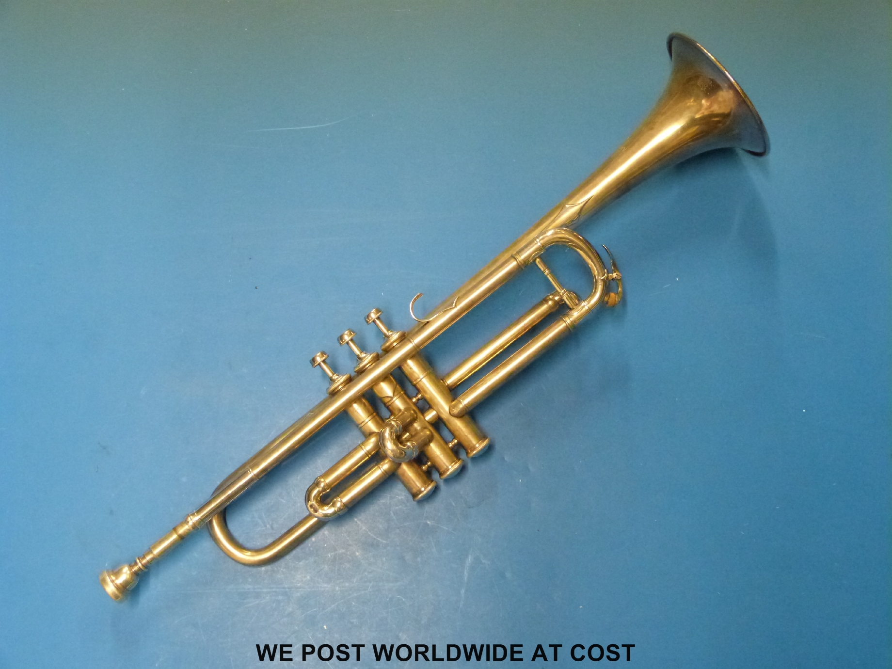 AV Ebblewhite of Aldgate, London, silver plated trumpet in case.