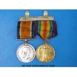 A WWI medal pair awarded to 36116 Pte G Davis Hampshire Regt
