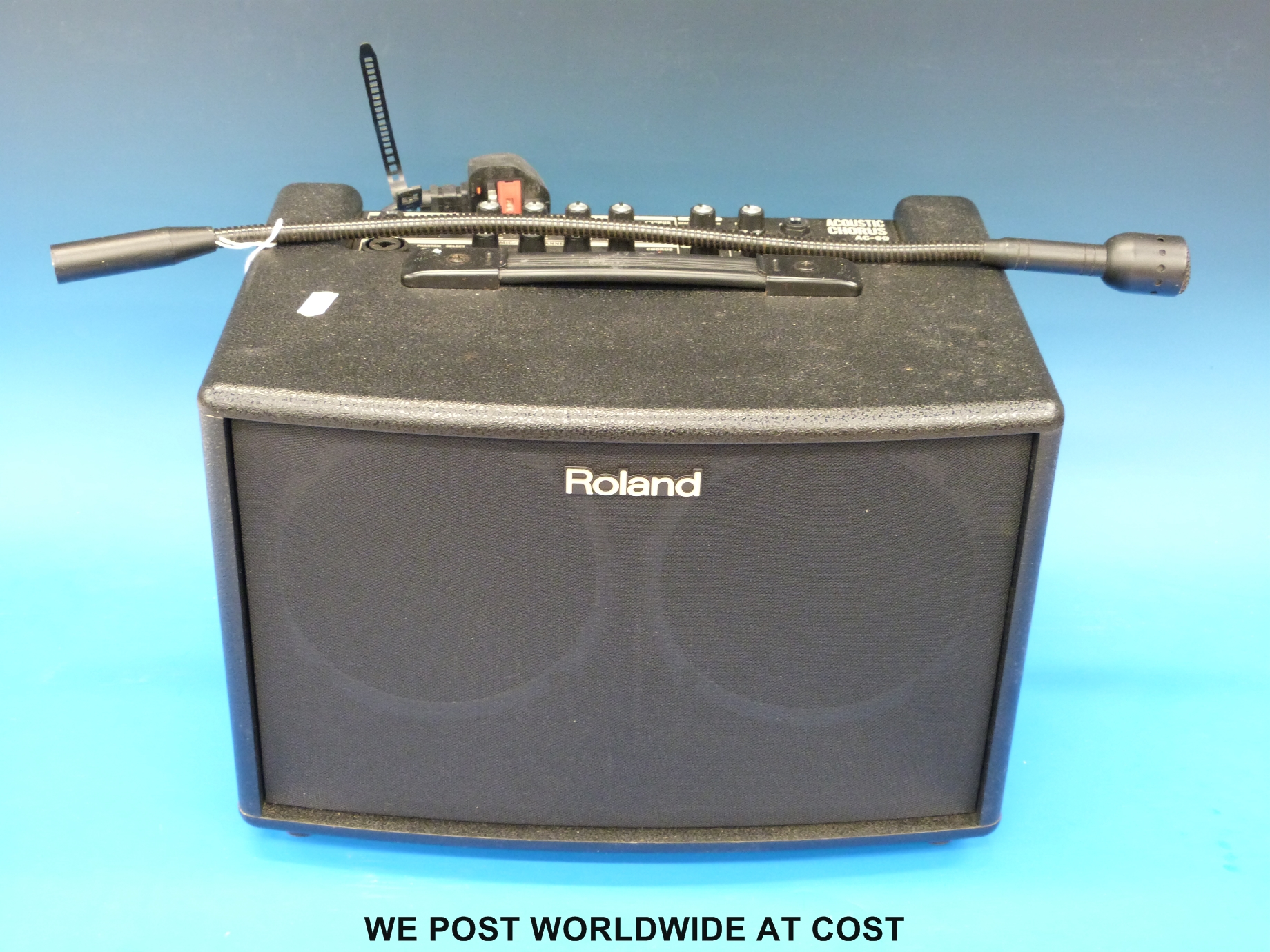 A Roland Acoustic Chorus AC-60 amplifier in soft carry case.