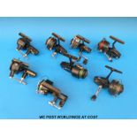 Eight Mitchell fixed spool fishing reels, models including 206, 324, 300A, 320 etc.