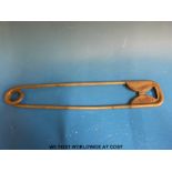 A point of sale novelty safety pin, probably ex shop fitting, length 46 cm.