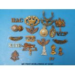 A quantity of military badges to include Barrow & North Lonsdale,