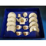 A Corona Queen Elizabeth Coronation child's commemorative ceramic tea set (in original box)