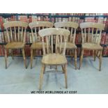 A set of six pine Windsor style kitchen chairs