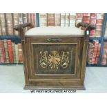 An inlaid rosewood and mahogany music seat/store full of sheet music