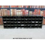 A metal military or similar style cubby hole unit (W130 x D23 x H44cm)