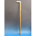 A marine ivory-handled walking stick with white metal collar marked "Dublin" with malacca shaft