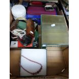 A quantity of brooches, beads, mirrored jewellery box,