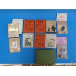 A handmade album of cards, several foreign translations of Peter Rabbit,