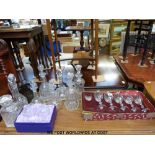 A quantity of glassware to include Stuart and Edinburgh Crystal decanters, boxed vases,