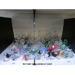 A collection of mainly glass swans (approximately 90) some fish and three small flying geese