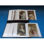 Approximately 60 Edwardian etc glamour postcards,