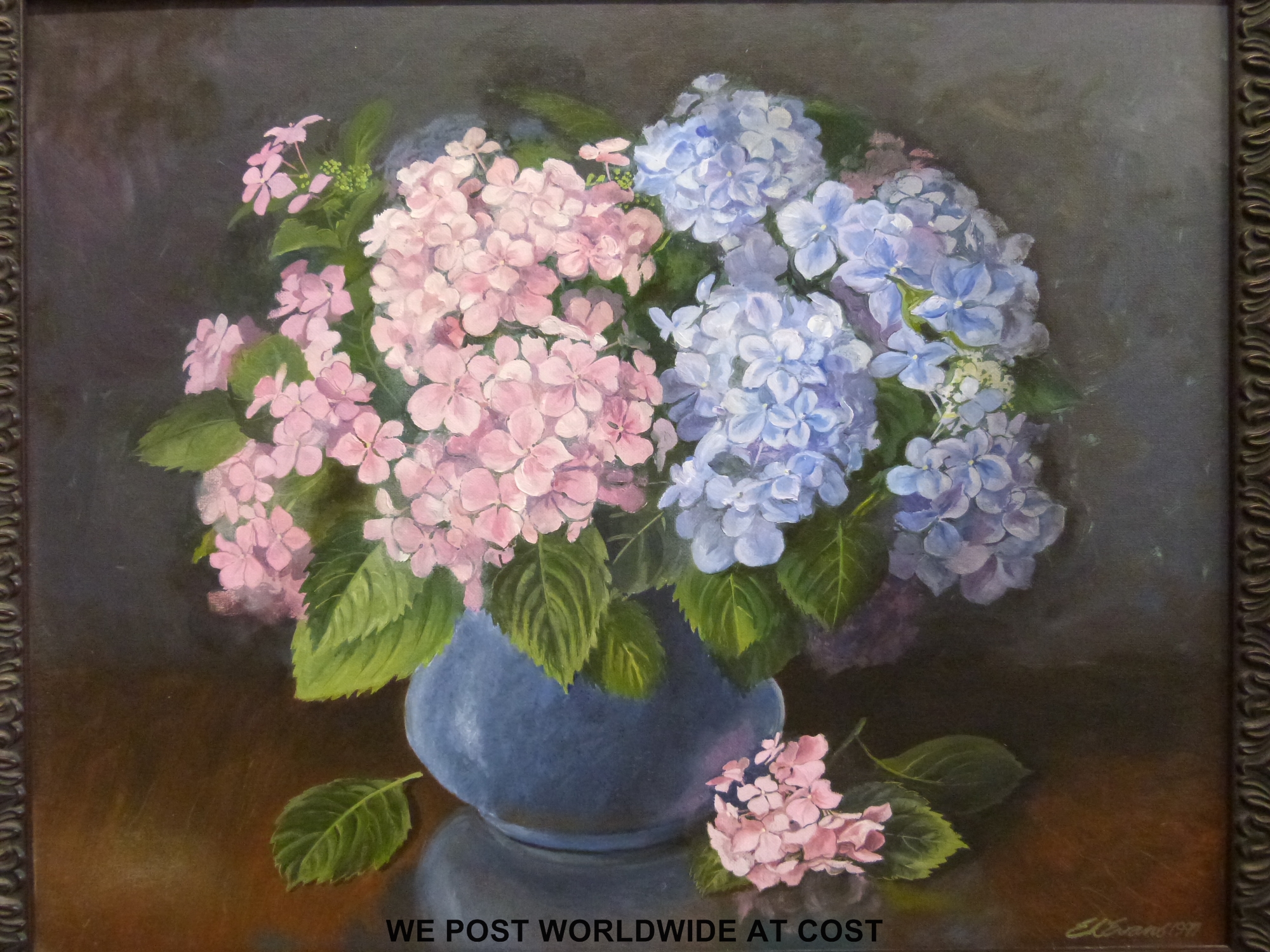 E L Evans oil on canvas still of hydrangeas in vase, signed and dated 1997 lower right,
