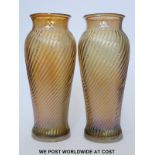 A pair Carnival Marigold iridescent glass swirl vases with flared rims (19cm tall)