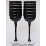 A pair of Nick Munro Tyrone black crystal wine glasses (24cm tall)