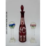 A pair of Murano glass flower paperweights on cut stems and bases (22cm tall) together with a flash