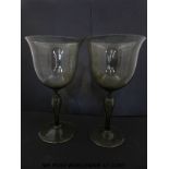 A pair of hand blown glass goblets with green tint (30cm tall,