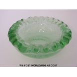 Daum Nancy green glass control bubble bowl with wavy rim, 17cm in diameter.