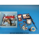 A collection of hallmarked silver items including a baby's rattle, hallmarked baby brooch, cutlery,
