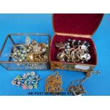 A collection of costume jewellery to include rings, earrings, silver chain, brooches,