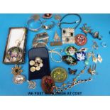 A quantity of silver jewellery to include bangles, brooches, bracelets,