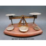 A set of TJ & J Smith Victorian postage scales with weights to base