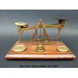 A late 19thC set of brass table top postal scales