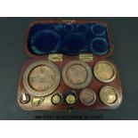 A cased run of Victorian City of London standard weights from 8oz with Degrave & Co and other
