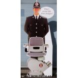 A lifesize Acorn stairlift policeman advertising figure