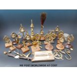 A quantity of horse brass type bells including swinging king's crown etc.