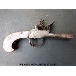 An English double barrelled side by side flintlock hammer action pocket pistol with ornate