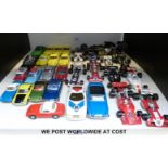 Thirty Corgi Toys diecast model vehicles including Batmobile, F1 cars,