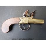 Clark, London brass framed flintlock hammer-action pocket pistol with named and engraved lock,