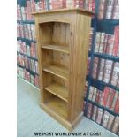 A pine bookcase with adjustable drawers (W66 D31 H131cm)