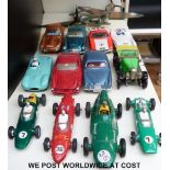 Fourteen Dinky Toys diecast model vehicles including two Spitfire aeroplanes 719, F1 cars, etc.