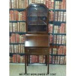 A mahogany Art Deco style bureau bookcase with Podger & Davis Ltd Weston Super Mare plaque to