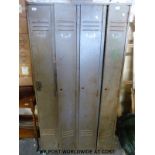 A four door set of metal lockers (W95 D38 H179cm)