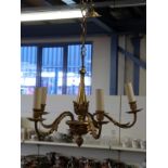 A gilt metal four branch chandelier