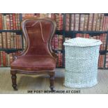 A Victorian nursing chair and Lloyd Loom basket