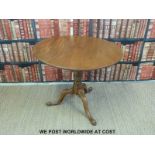 A 19thC mahogany circular single plank tilt top table (diameter 86,