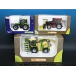 Three Universal Hobbies diecast model tractors, two Country Collection and one Deutz Fahr,
