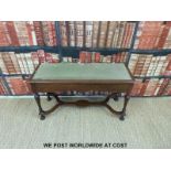 An upholstered mahogany duet piano stool/window seat,