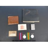 A WWII medal pair comprising 1939-1945 medal and Defence medal in box marked A. J. B.