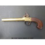A French brass overcoat pistol named J&W Richard to one side and A.