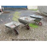 Three vintage wheelbarrows,